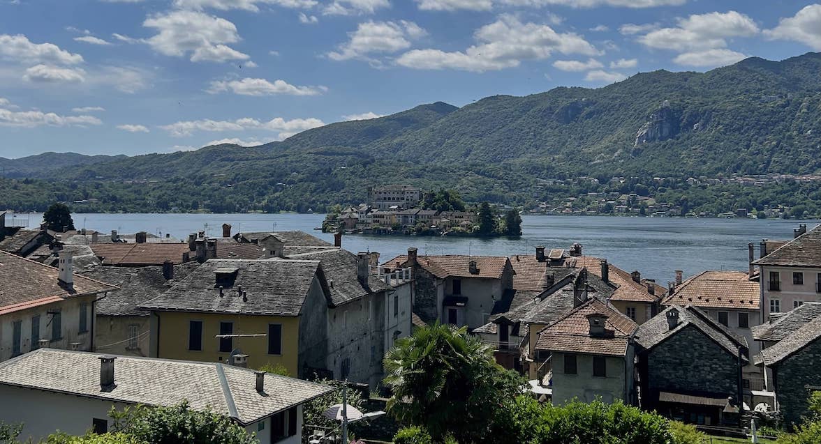 Isola di San Giulio visible in the center of the lake.