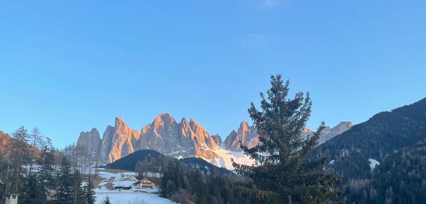 A winter sunset at the base of the Italian Dolomites.