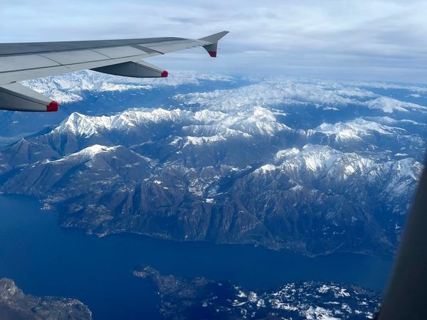 Flying over the Italian snow-capped Alps.